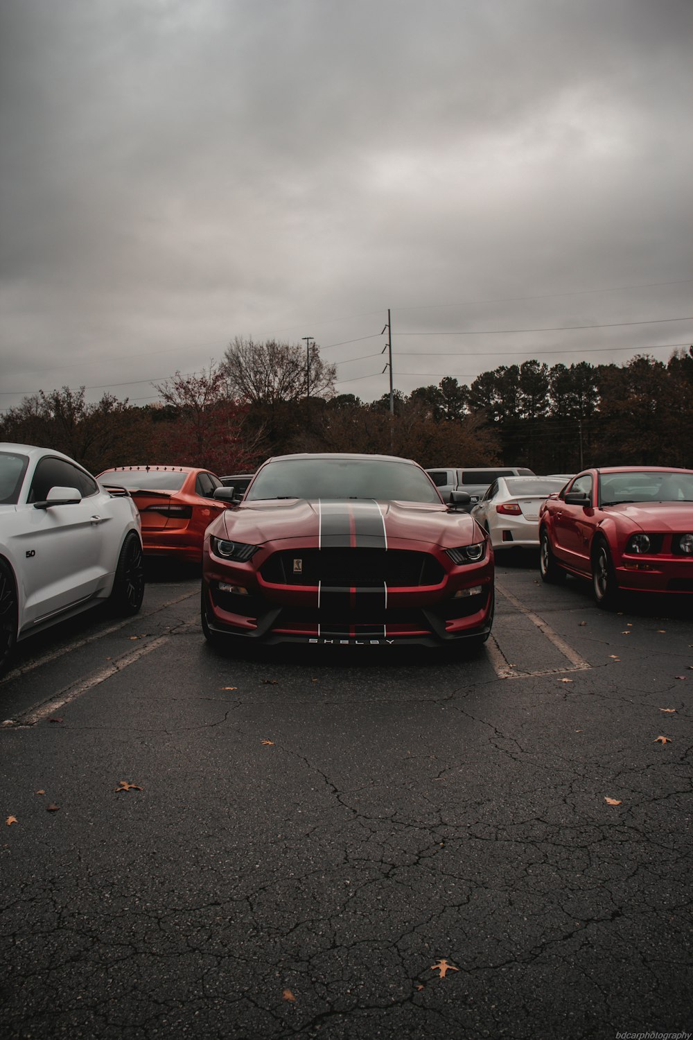 a group of cars parked in a parking lot