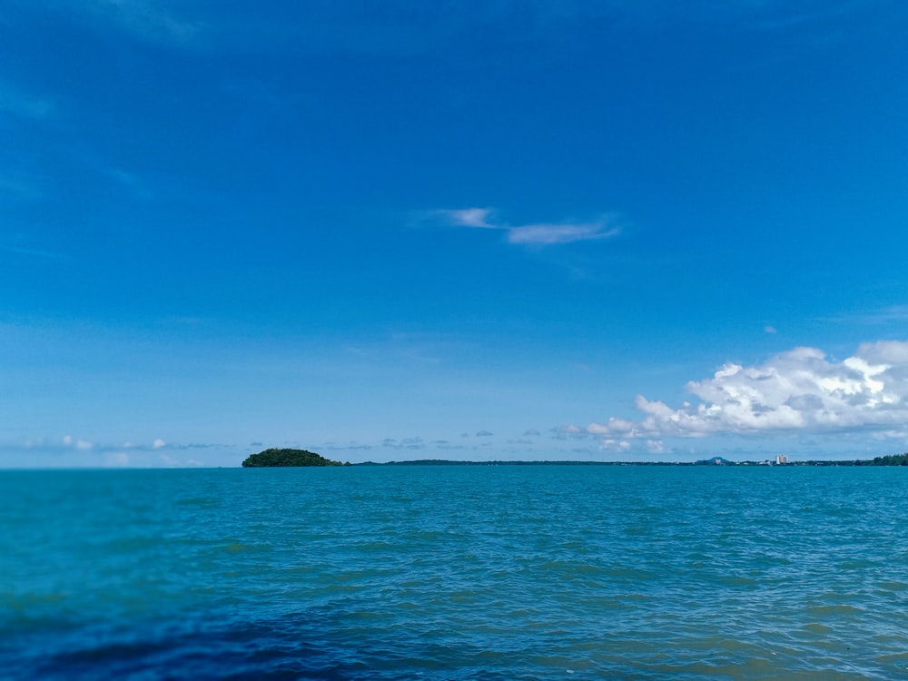 a small island in the middle of a large body of water