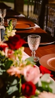 A beautifully arranged table with colorful home decor items.