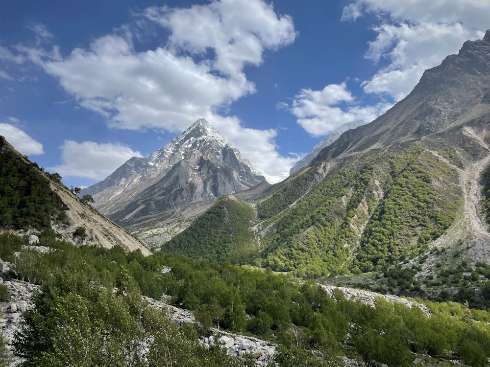 a view of a mountain range with a river running through it