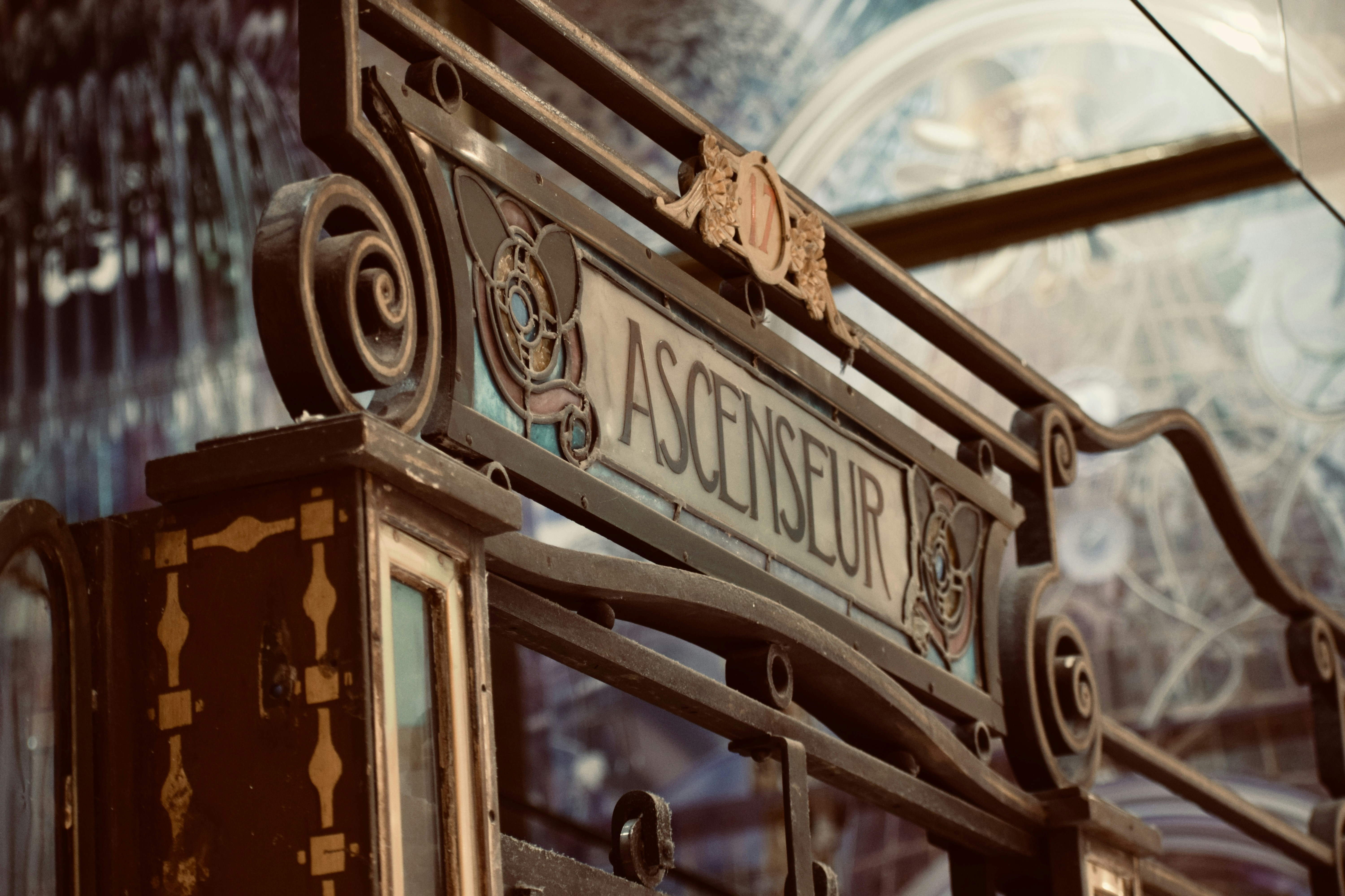 a close up of a street sign near a building