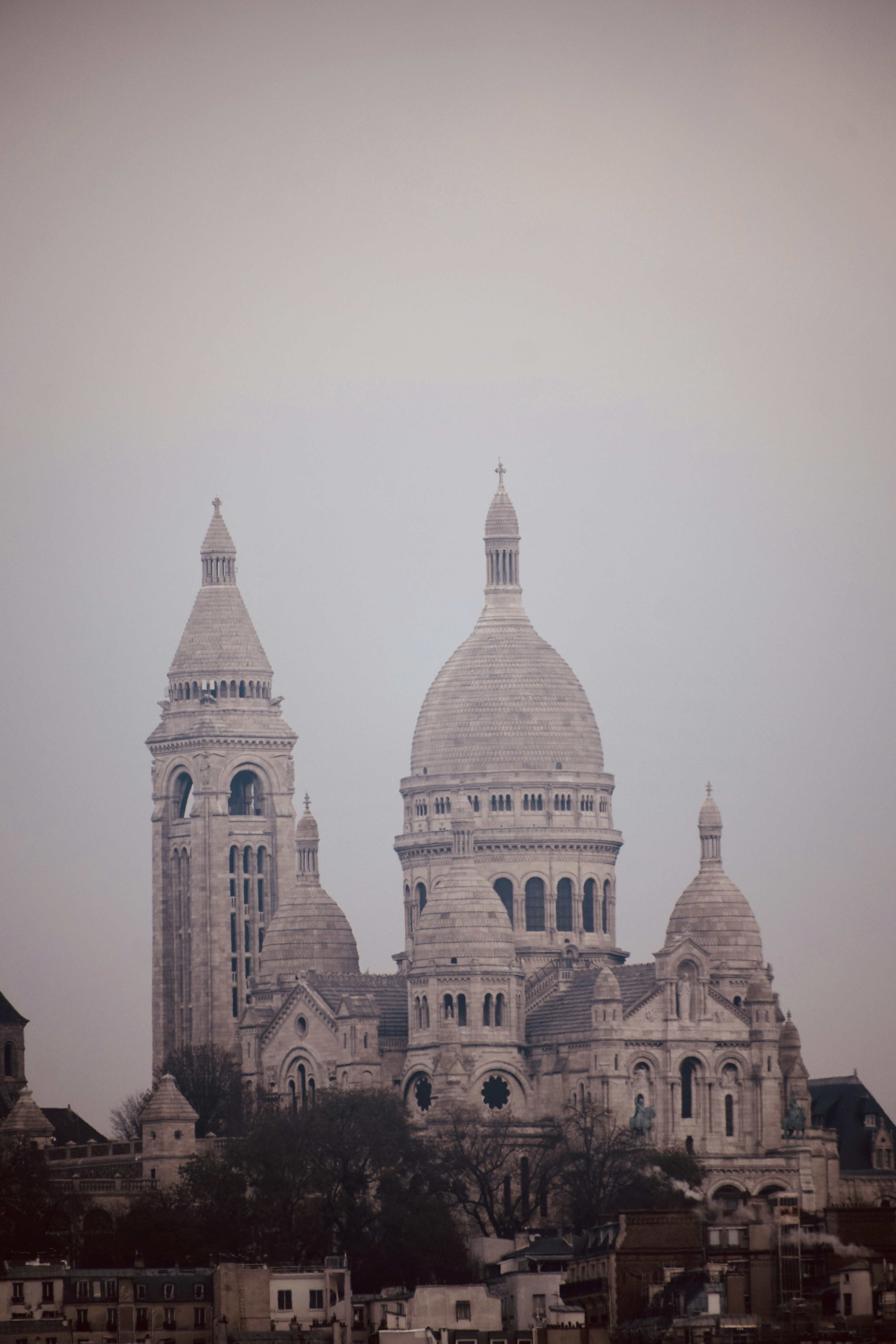 a large building with two towers on top of it