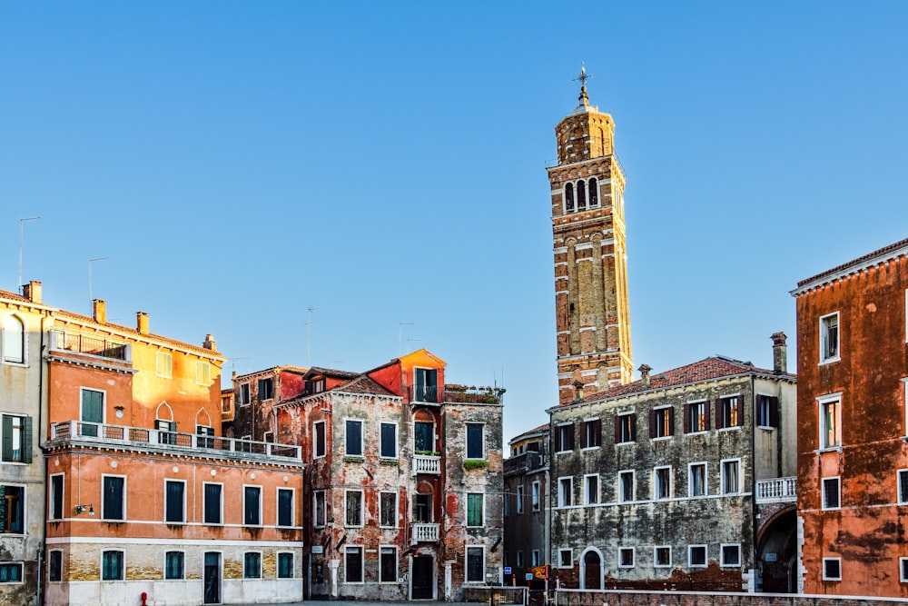 a tall clock tower towering over a city