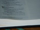 A close-up view of an open Bible page showing text with a focus on the passage titled 'The branch from Jesse', referencing Isaiah 11. The text is in two columns and presented in black print on white paper, with dotted lines in the margin.