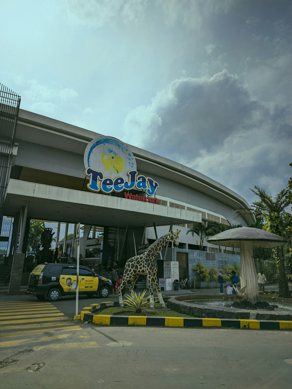 a building with a sign that says teepeelay on it