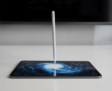 Minimalist design of NoteFlow app on a tablet with deep black background.