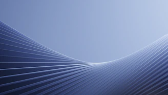 a blue abstract background with lines and curves