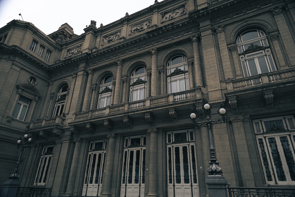 a large building with many windows and balconies