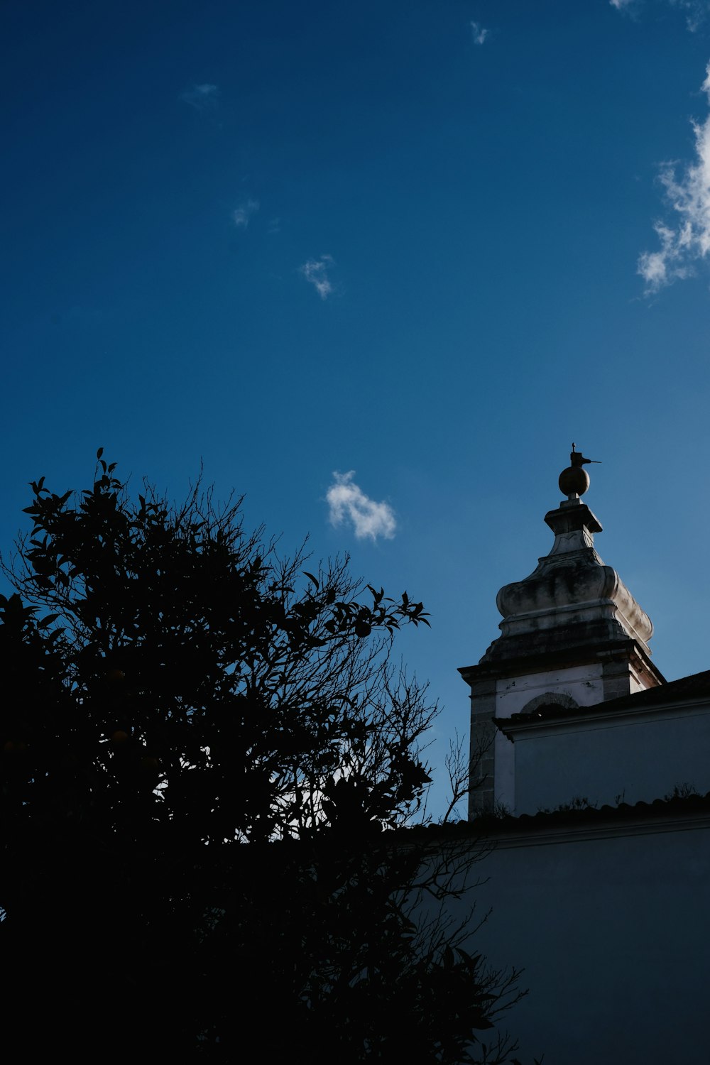 a building with a steeple and a clock on it