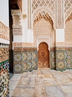 a doorway in a building with a tiled floor and walls