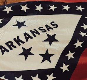a flag with the name of the state of arkansas