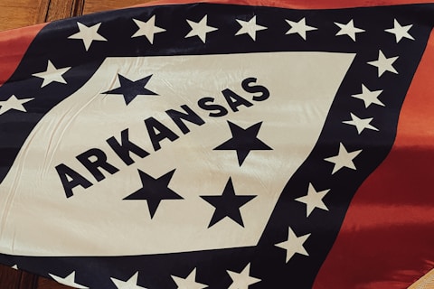 a flag with the name of the state of arkansas