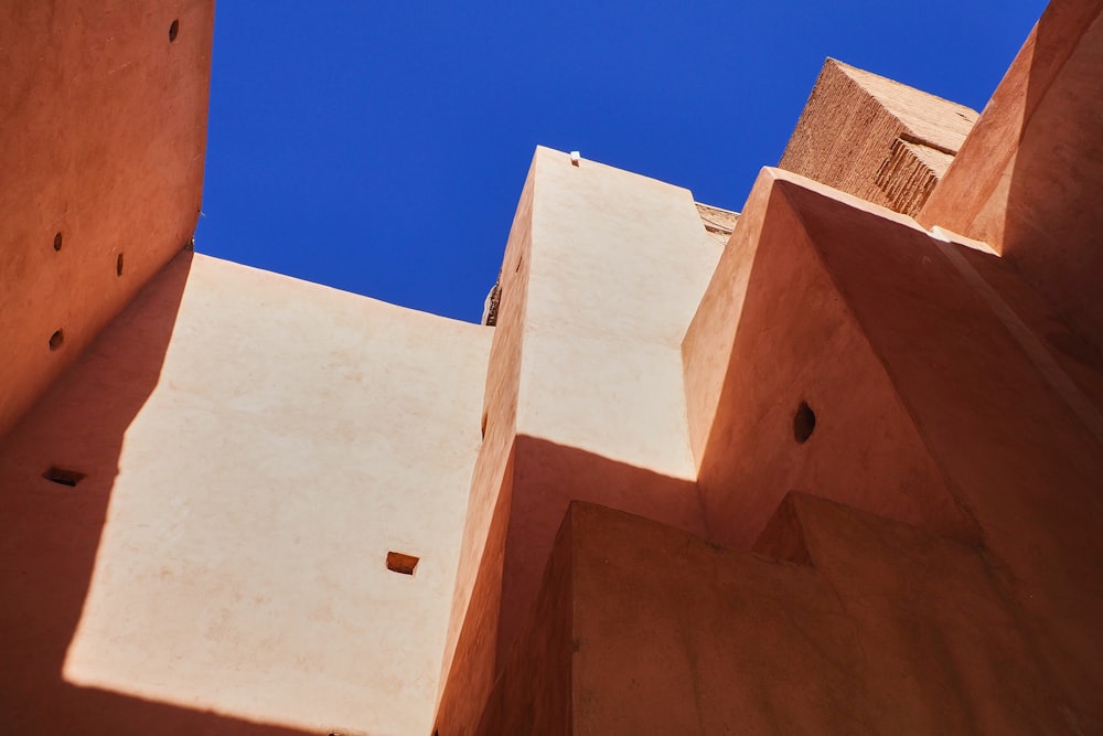 a building with a blue sky in the background