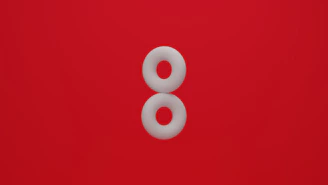 a number eight on a red background