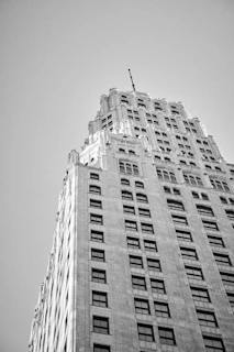 A vintage black-and-white photo of South Flower Street's historic main building with intricate architectural details.