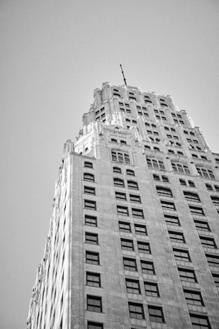 A vintage black-and-white photo of South Flower Street's historic main building with intricate architectural details.