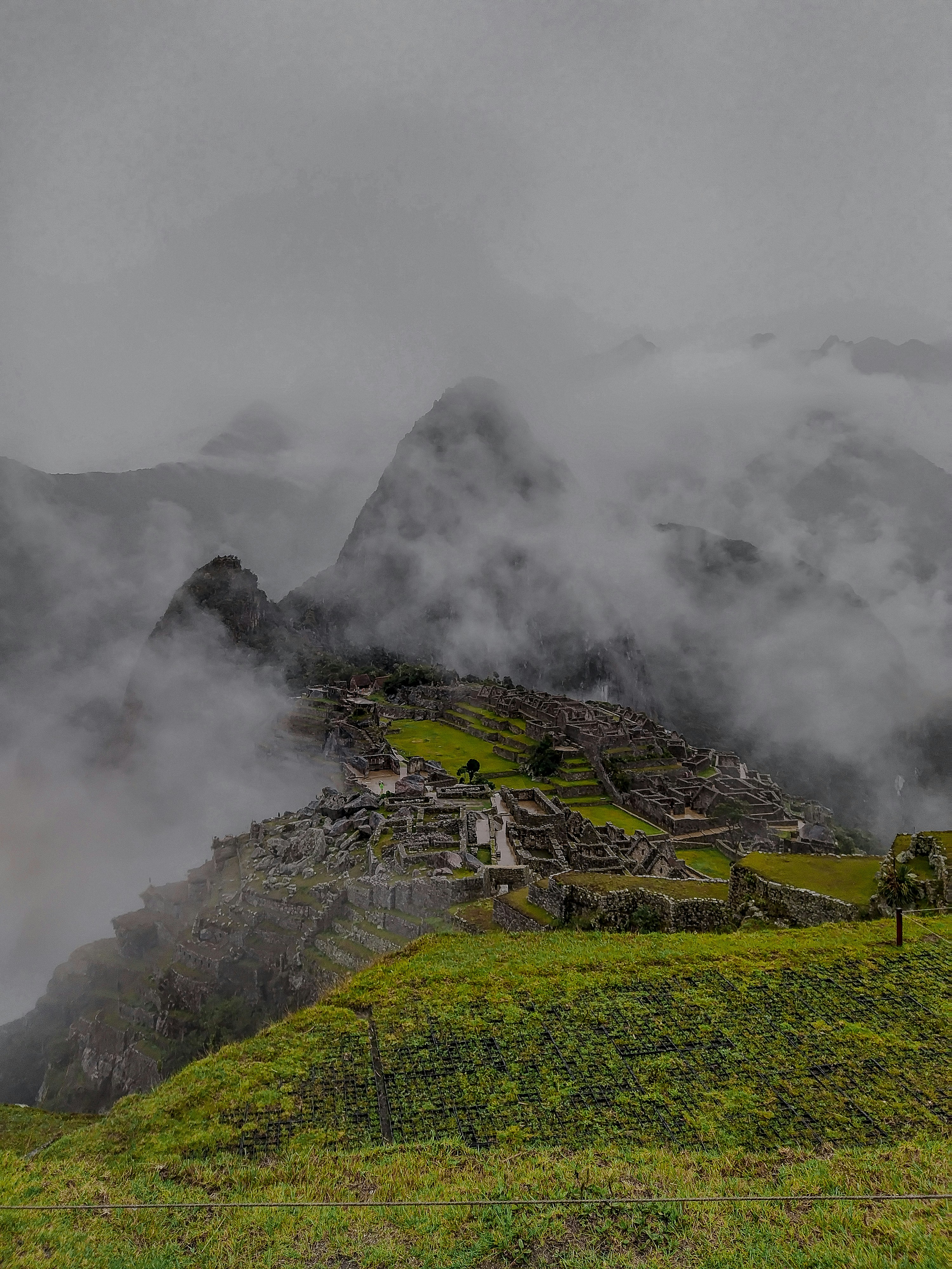 a mountain with a small village on top of it