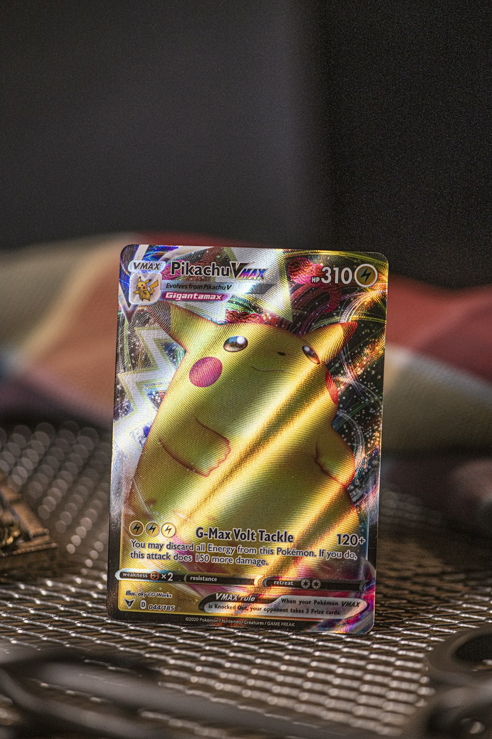 a pokemon trading card sitting on top of a table