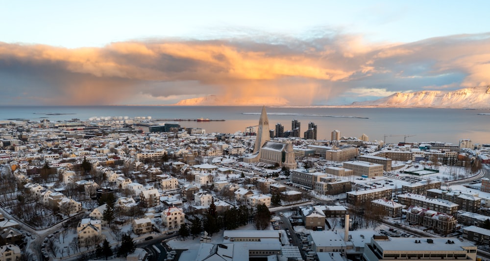 a view of a city with snow on the ground