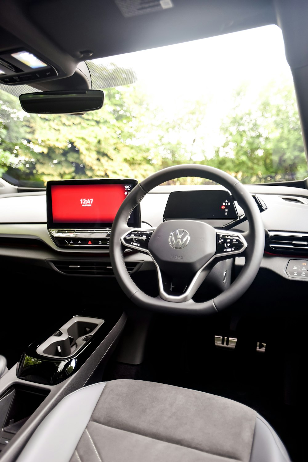 the interior of a car with a red screen