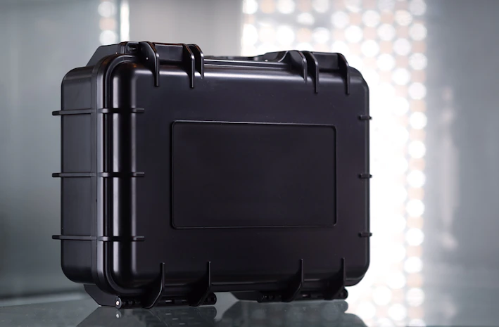 a black case sitting on top of a table
