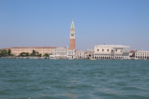 Historic Castel dell'Ovo overlooking the sparkling sea under clear skies