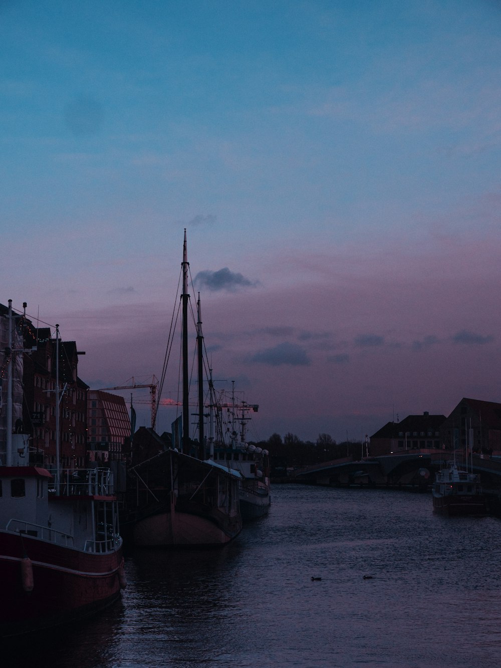 a couple of boats that are sitting in the water