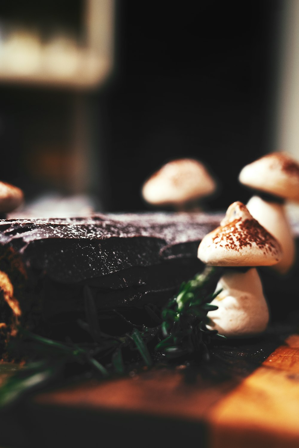 a group of mushrooms sitting on top of a wooden table