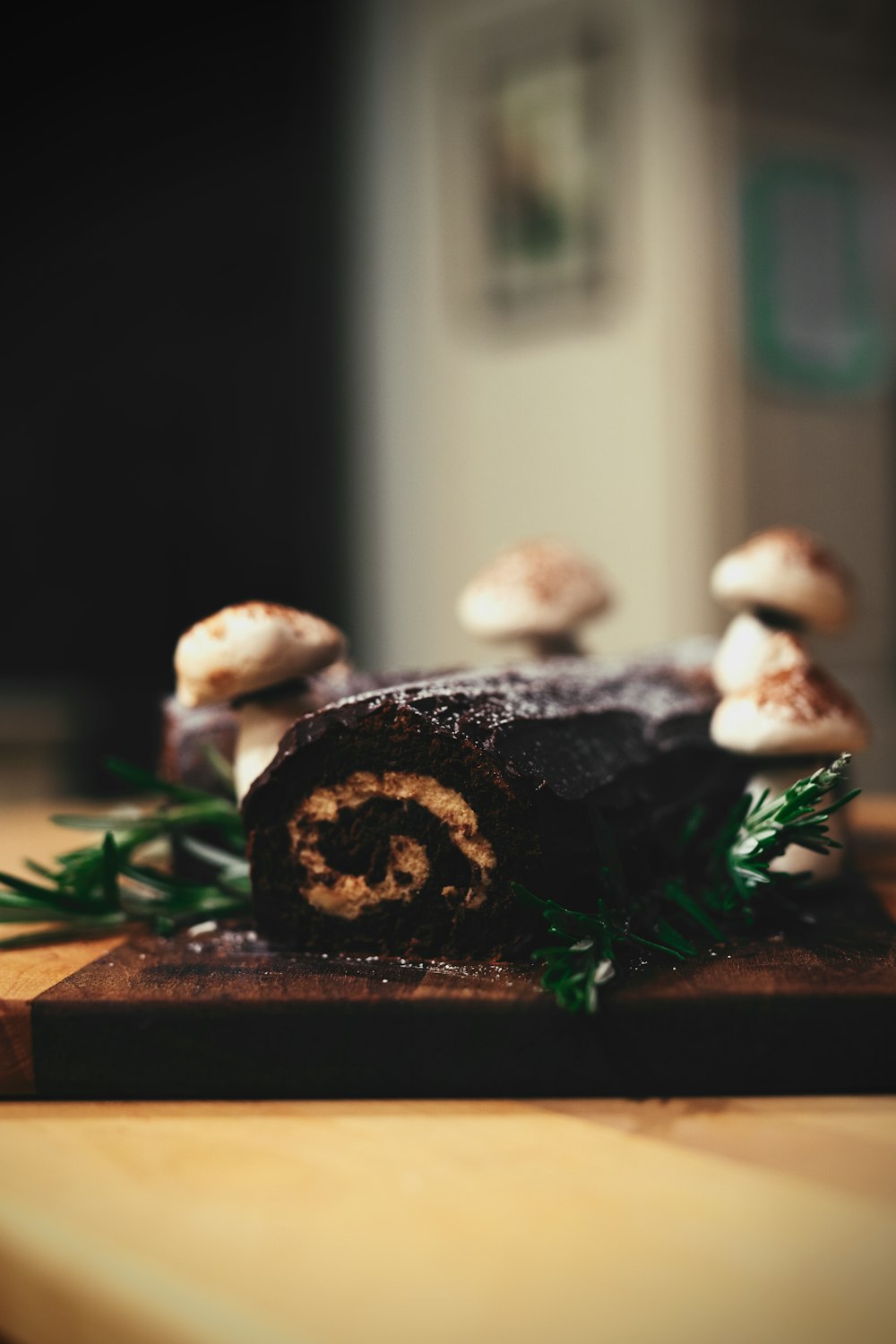 a piece of food on a wooden cutting board