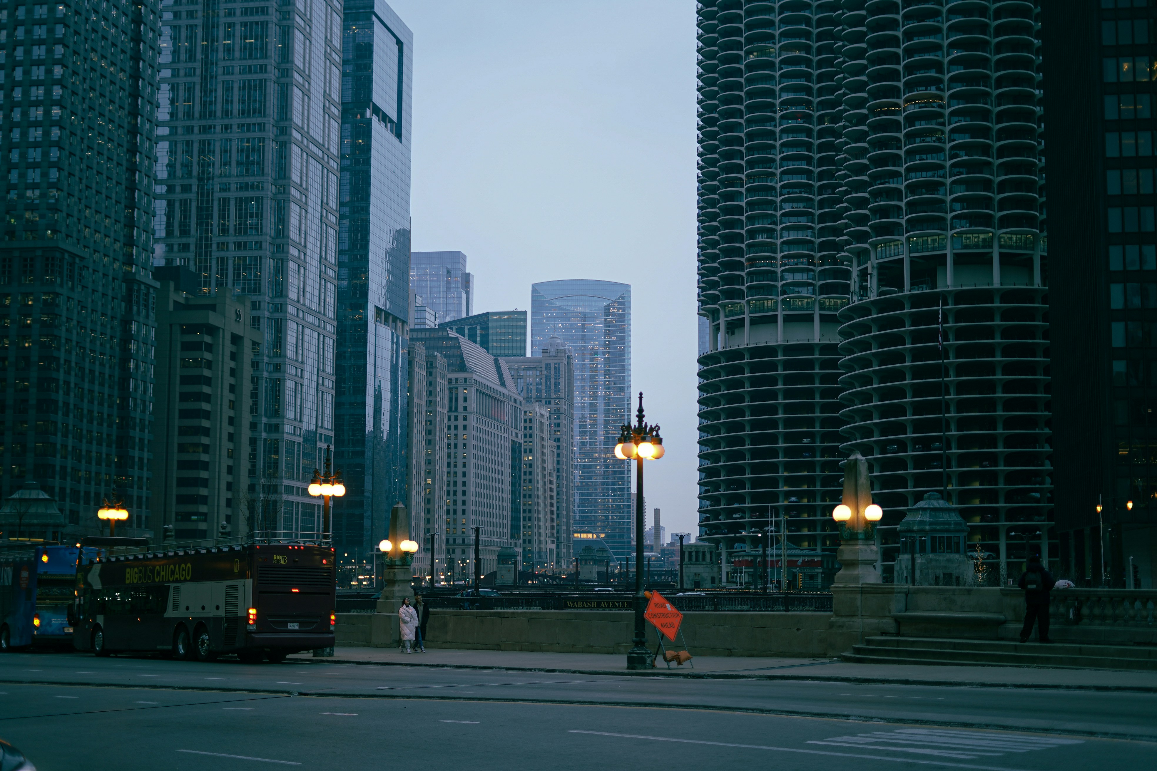 a city street with a lot of tall buildings