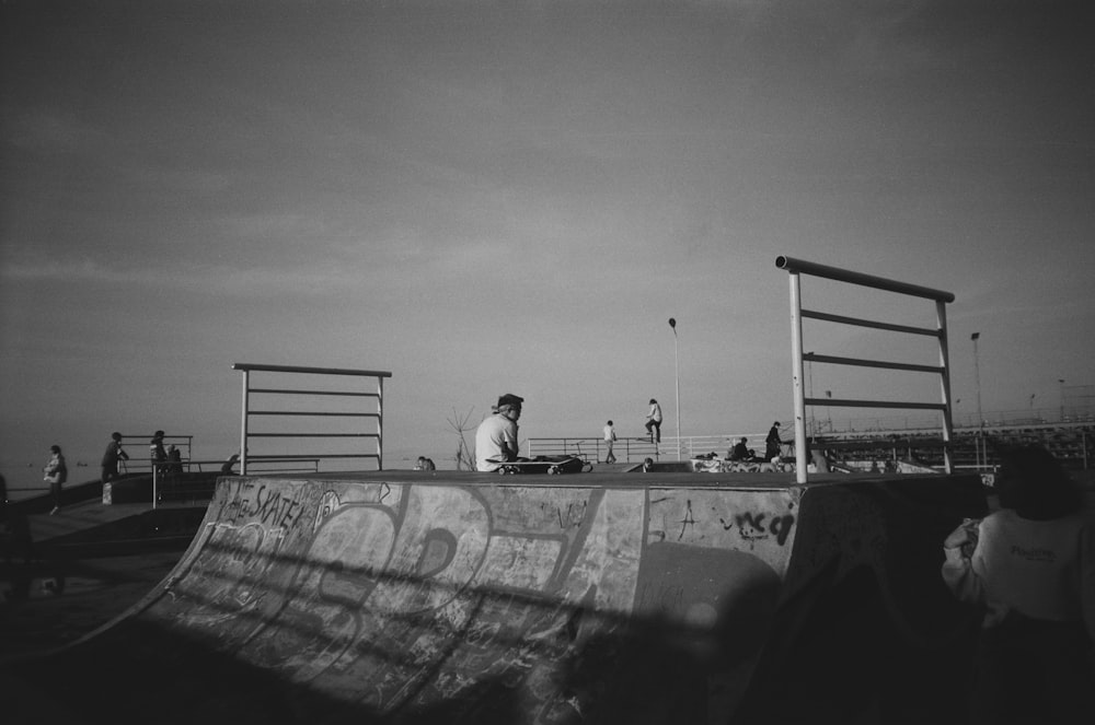 a man riding a skateboard up the side of a ramp