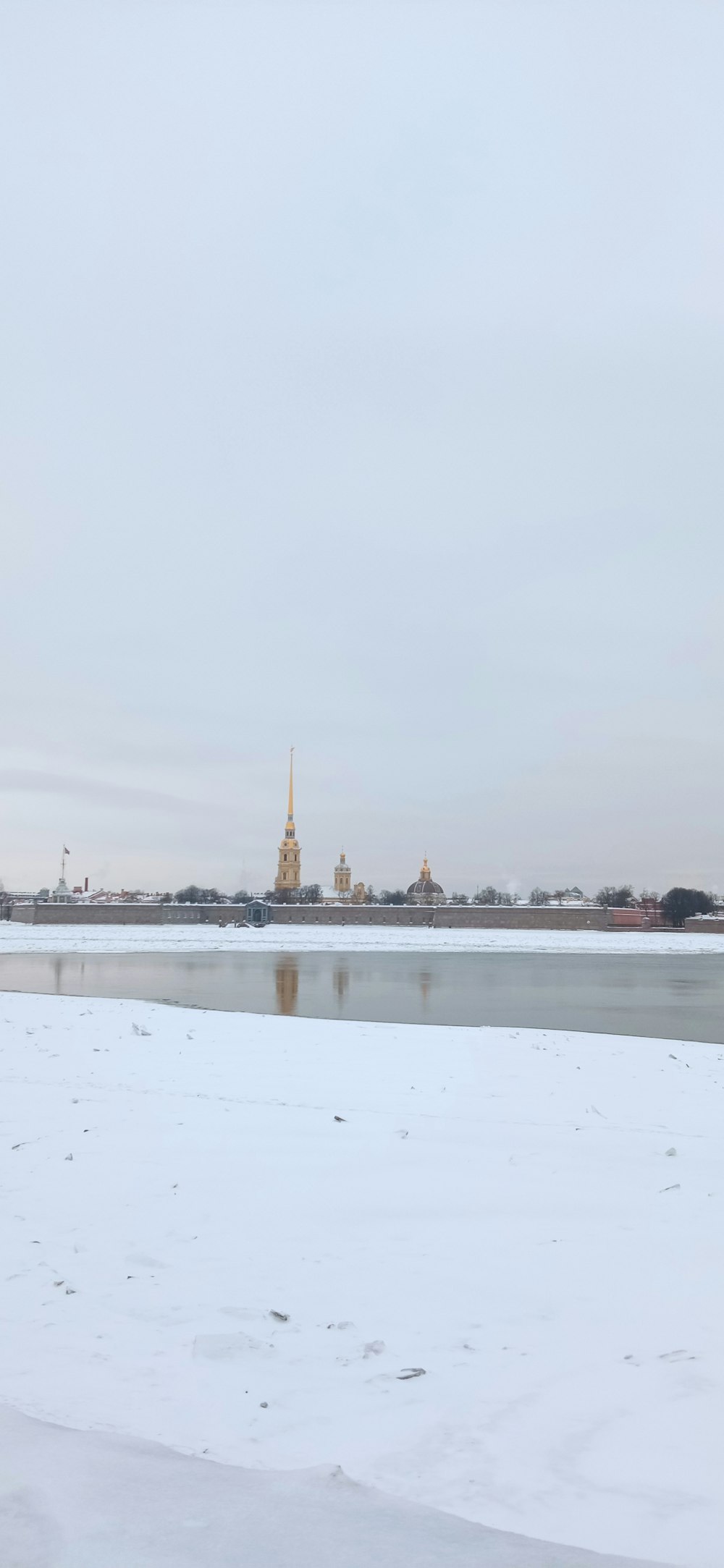 a large body of water covered in snow