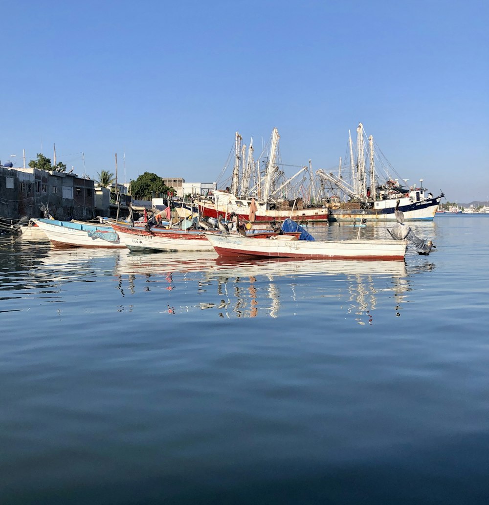 a couple of boats that are sitting in the water