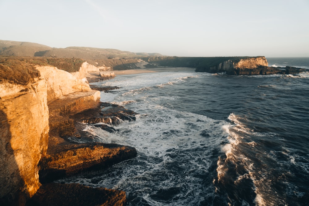 a view of the ocean from a cliff