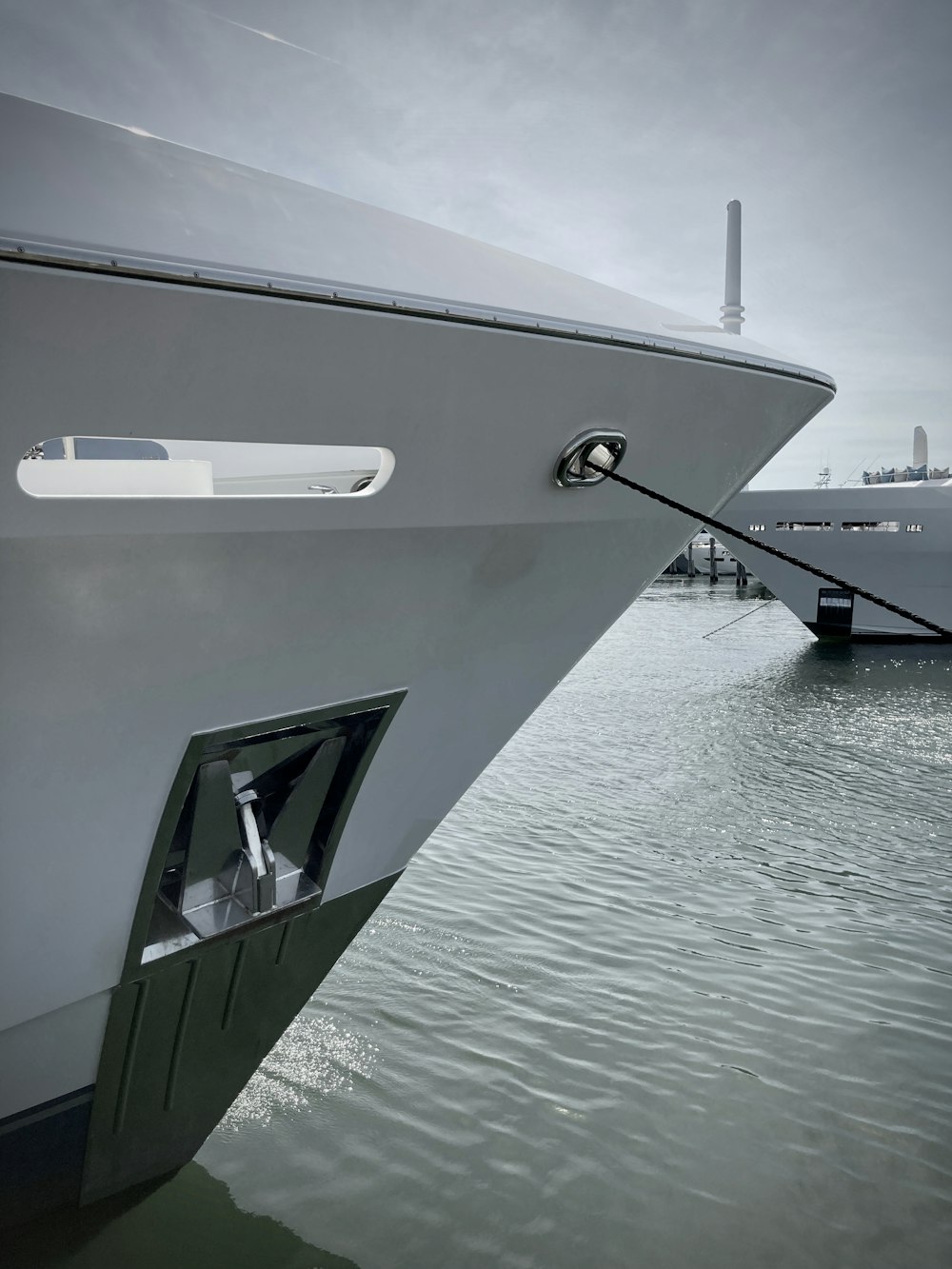 a boat is docked in the water near a dock