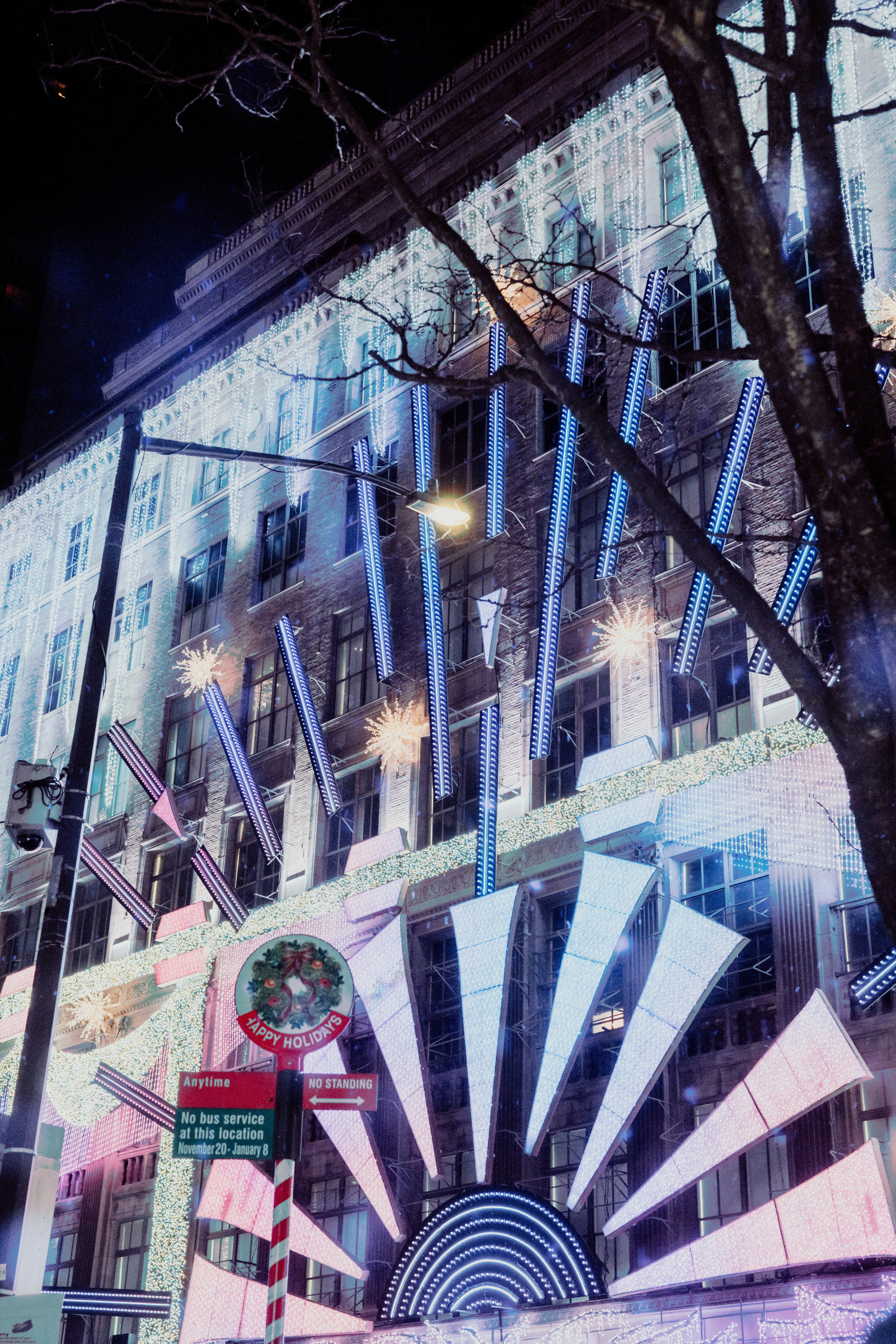 a large building with a giant fan on the side of it