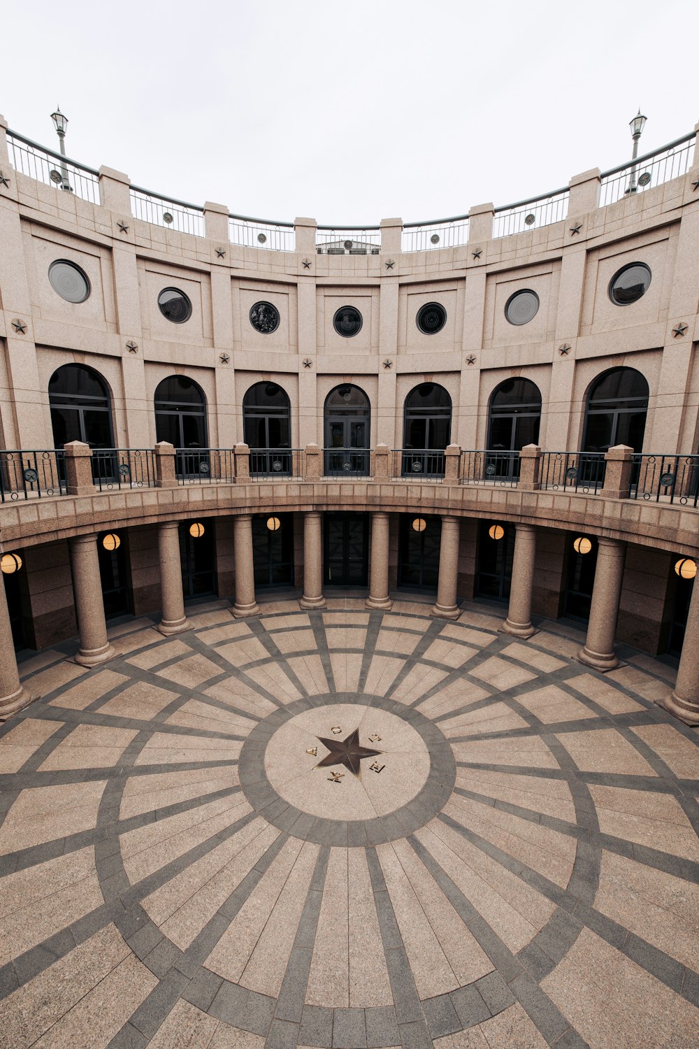 a circular building with a star on the floor
