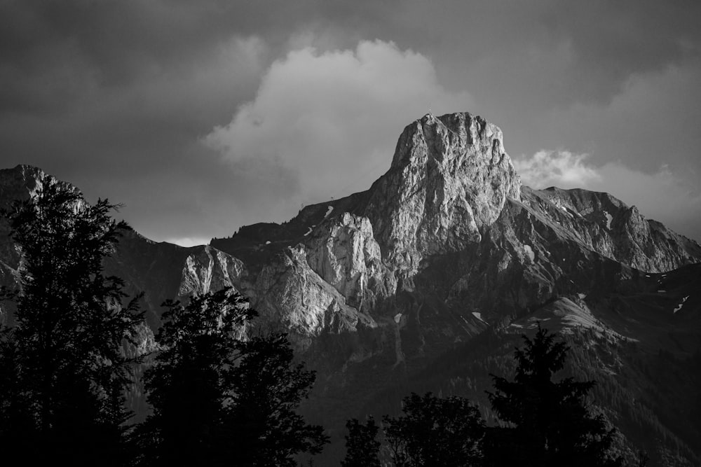 a black and white photo of a mountain