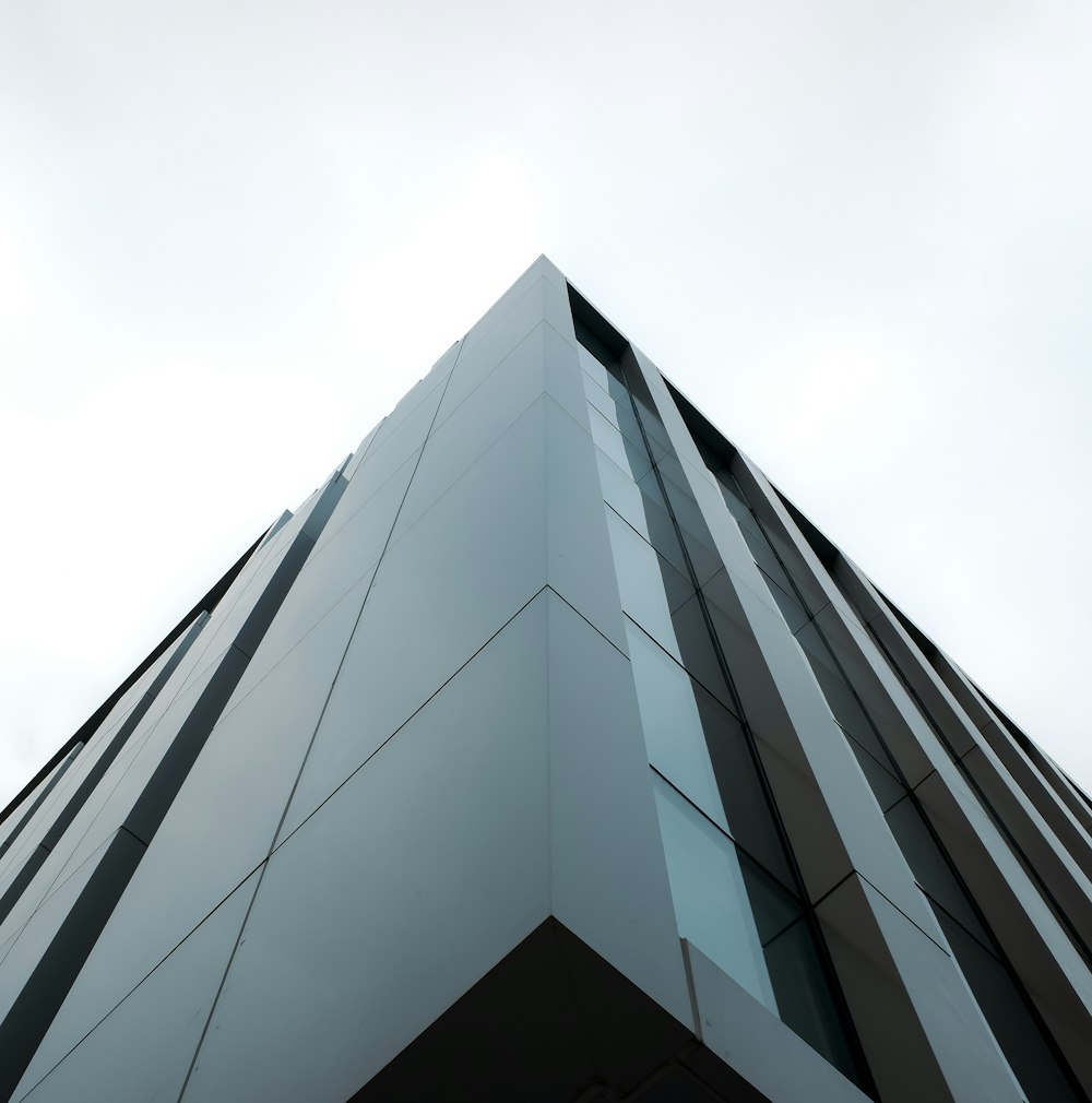 a very tall building with a sky in the background