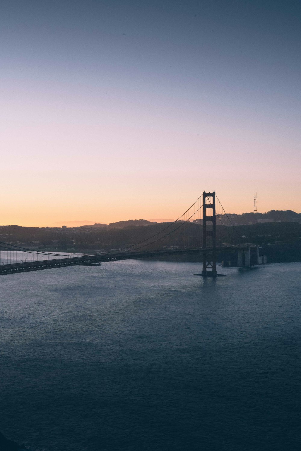 the golden gate bridge in san francisco at sunset