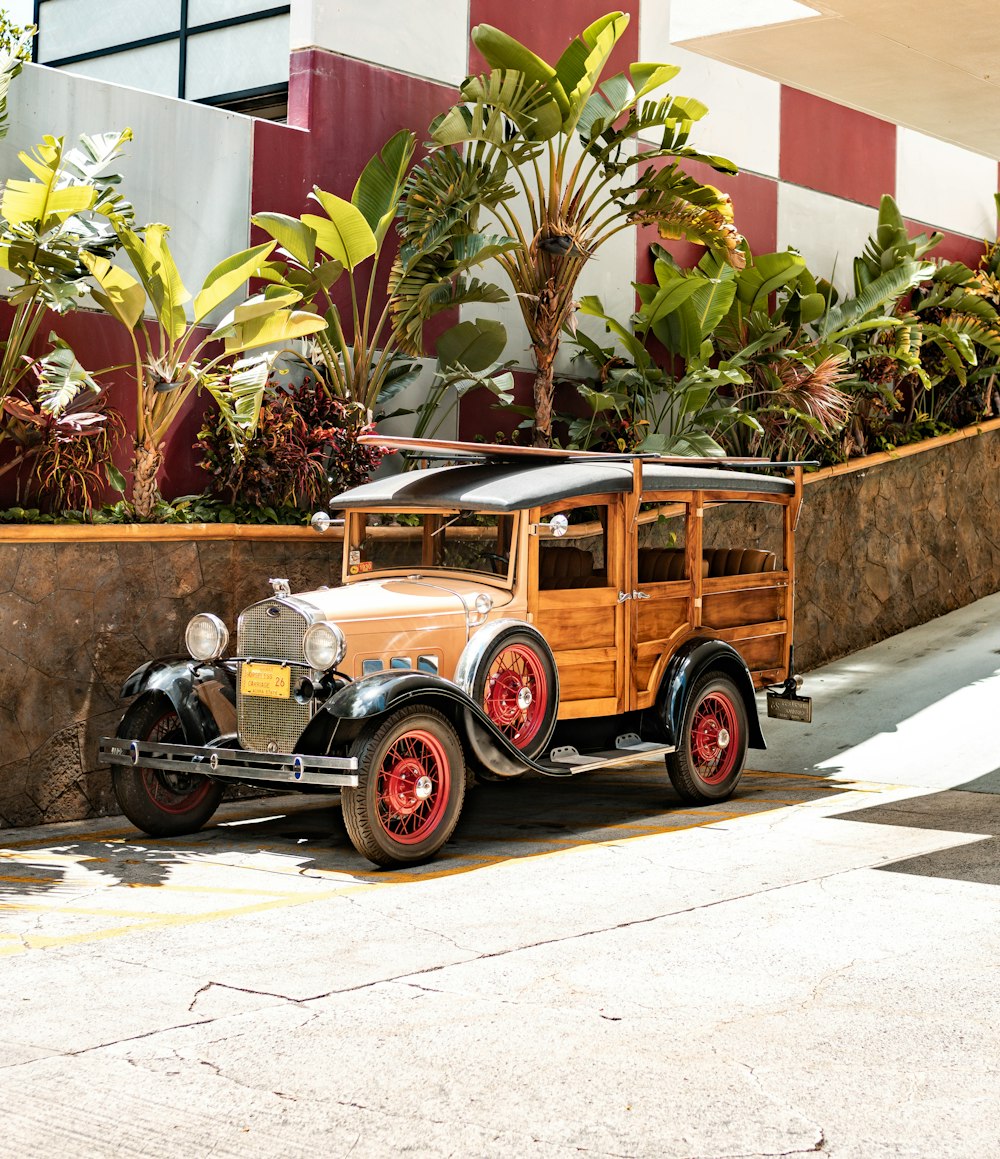 an old car parked in front of a building