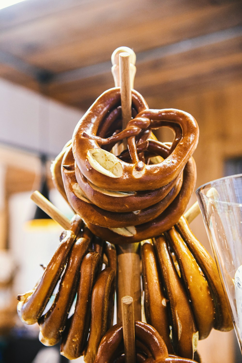 a bunch of pretzels hanging from a rack