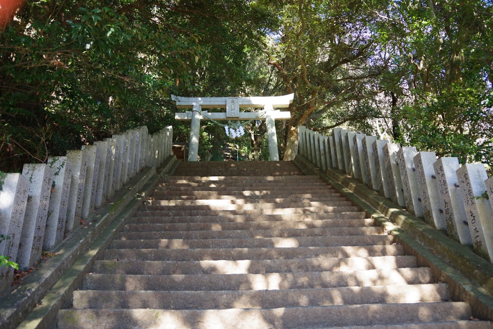 a set of stairs leading up to a shrine