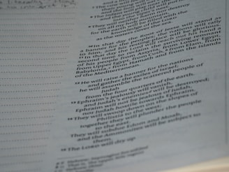 A page from a book, displaying text on the right side, while the left side is blank except for evenly spaced horizontal dots. The text is formatted in a justified style with numbers for each line, indicating a structured layout, likely from a religious or reference book.