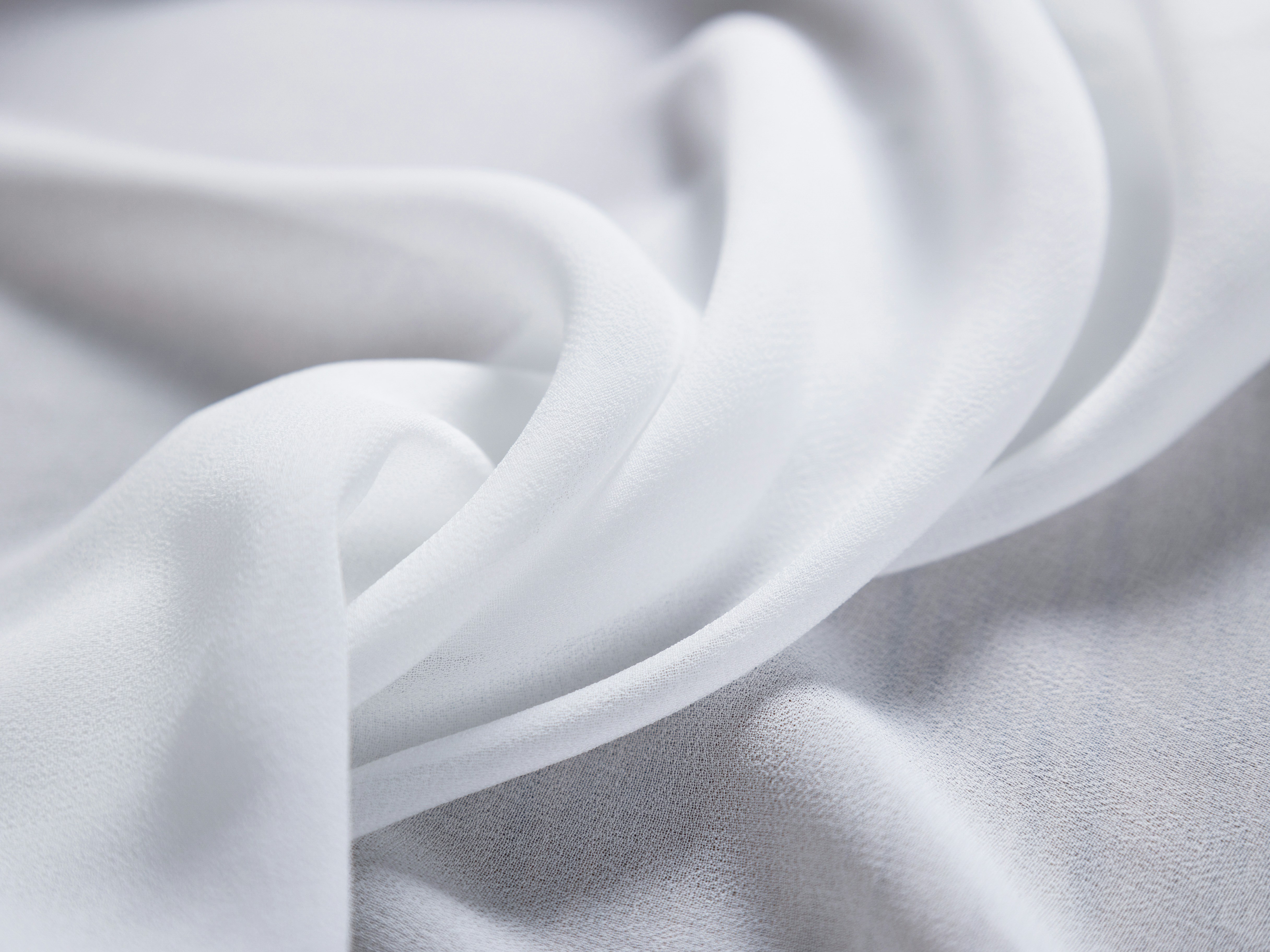 a close up view of a white fabric