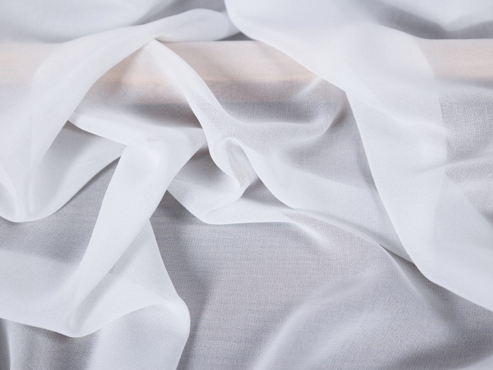 a close up view of a white fabric