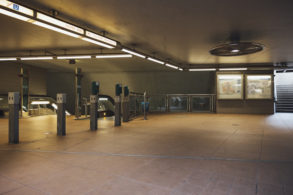 a large empty parking garage with a bunch of lights