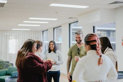 a group of people standing in a room