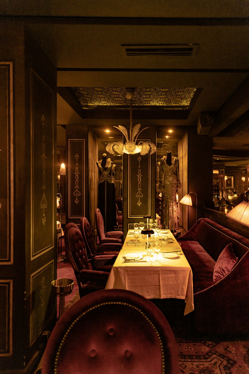 a dining room with a table and chairs