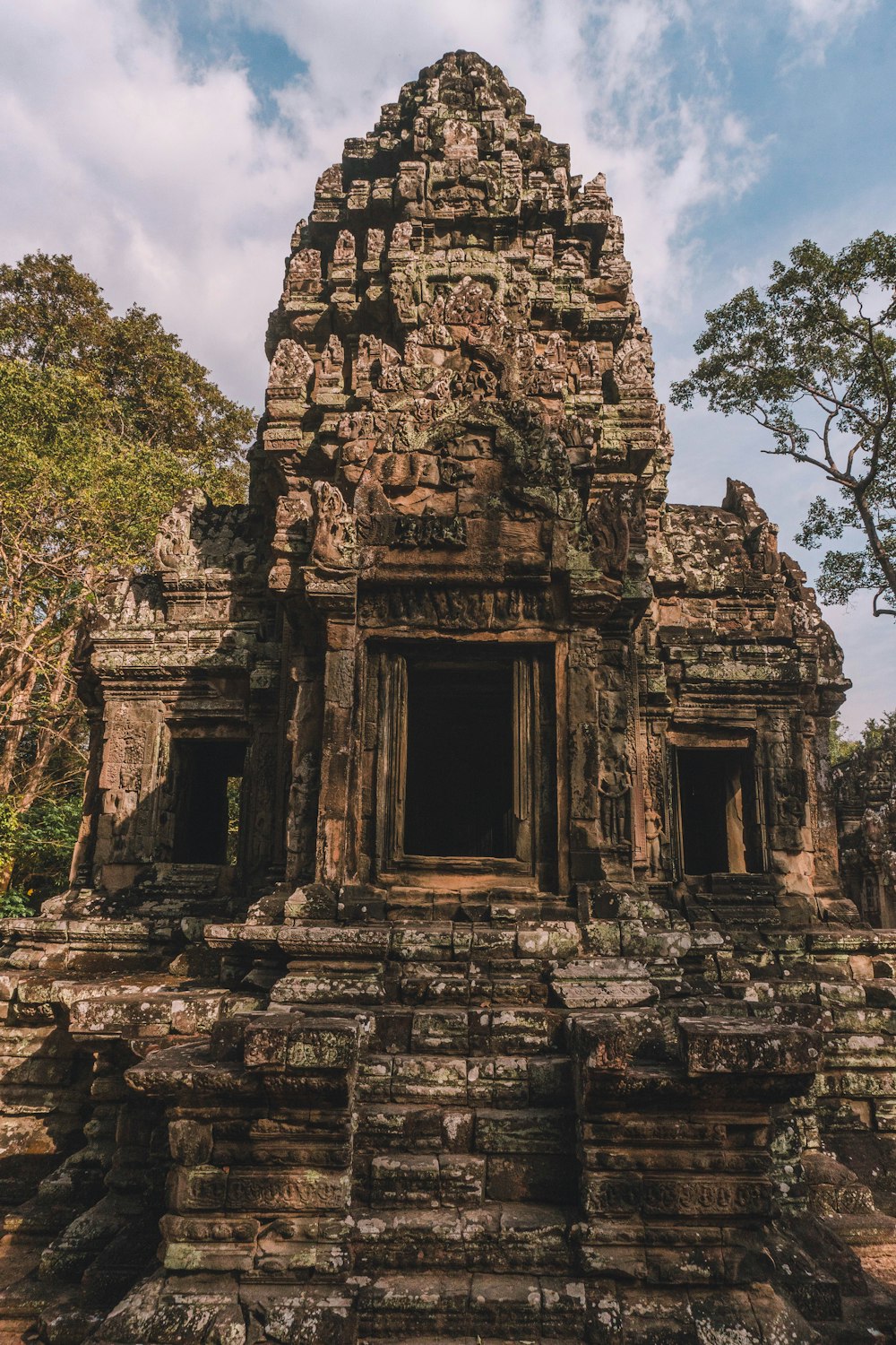 a stone structure with a doorway in the middle of it